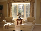 Natural light through a window creates a changing backdrop for stone display